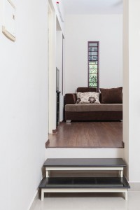 Steps leading to the Dining Room at a lower level from Living Room.